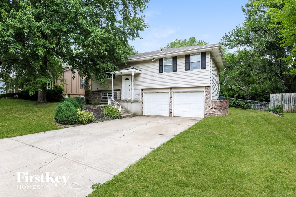 A house with a garage is for sale by FirstKey Homes.