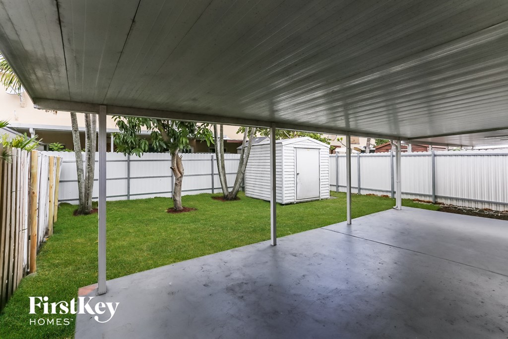 A patio area with a FirstKey Homes logo.
