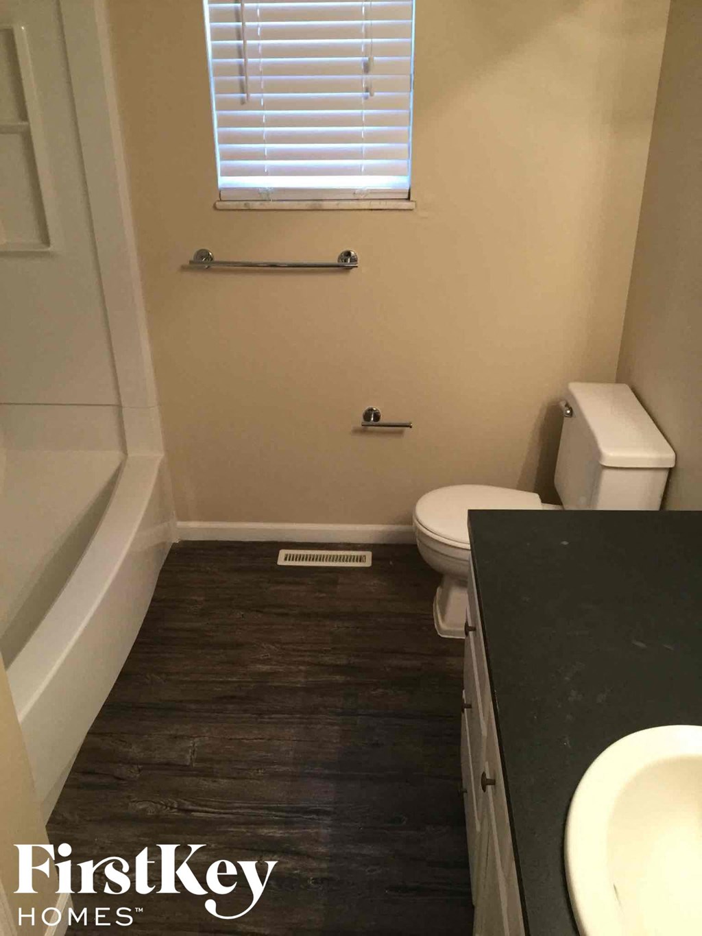 a small bathroom with a toilet and a sink