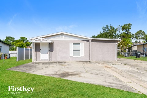 A single-story house with a garage is for sale by FirstKey Homes.