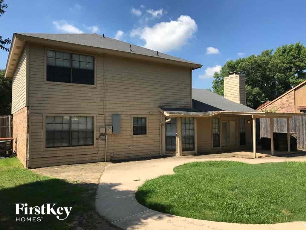 A house with a FirstKey Homes logo.