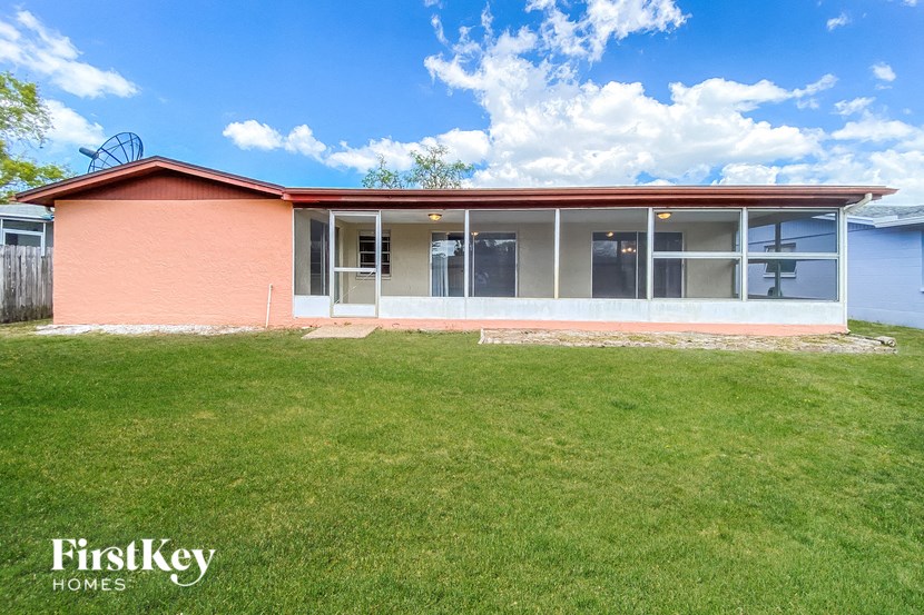 a house with a lawn in front of it