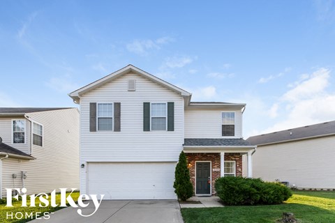 A house with a garage is for sale by FirstKey Homes.