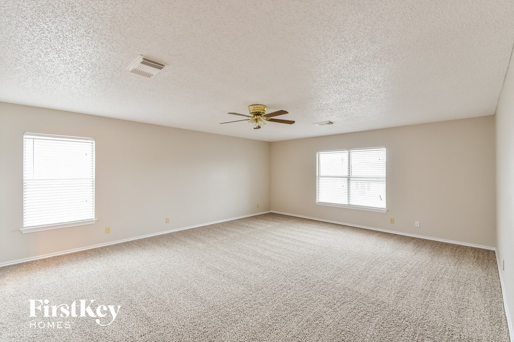 the living room is clean and ready to use