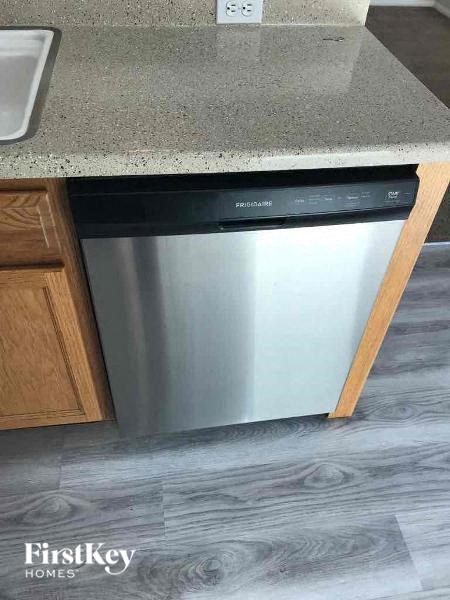 A dishwasher is installed in a kitchen.