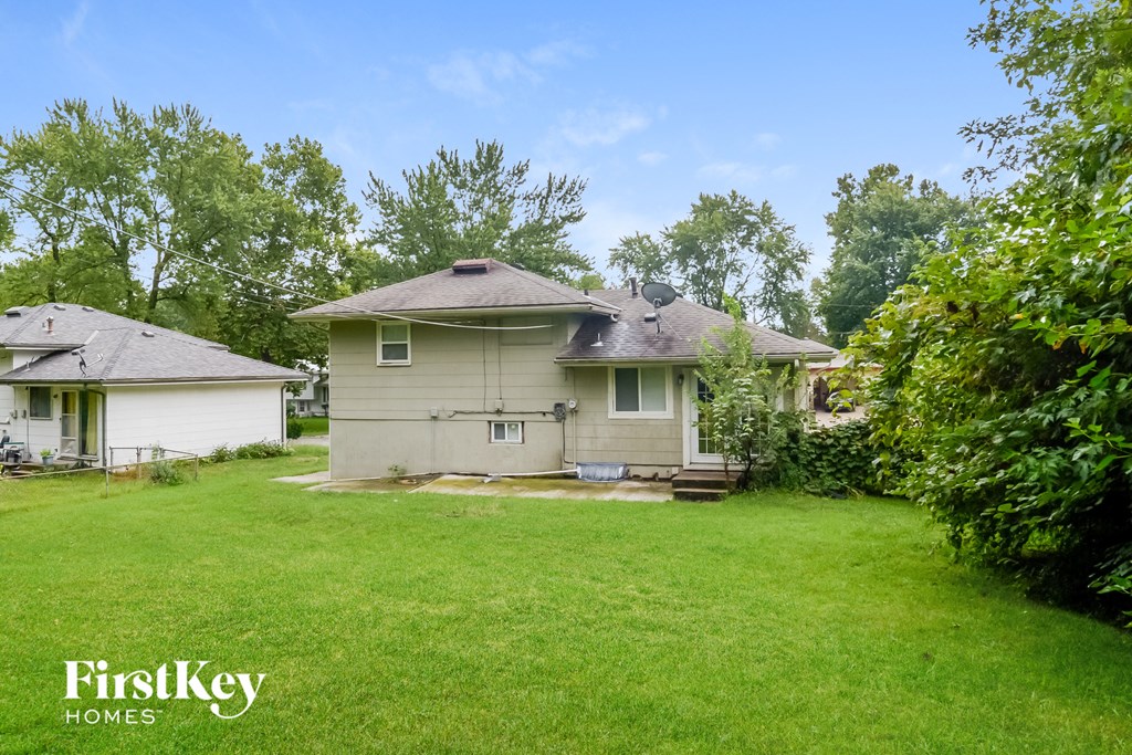 a house with a yard in front of it