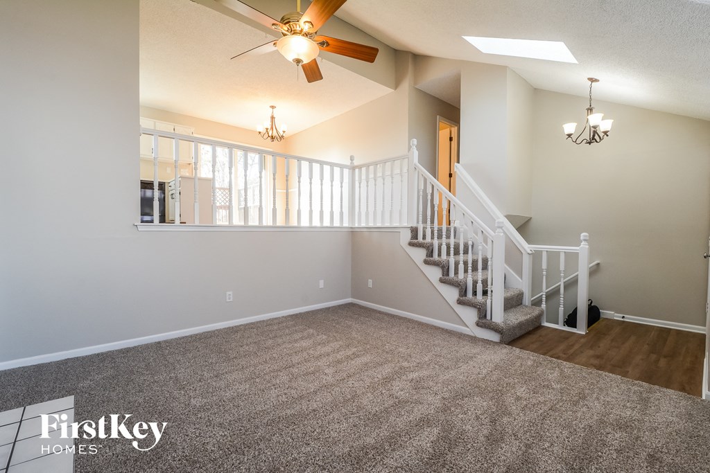 the upstairs living room with stairs to the loft