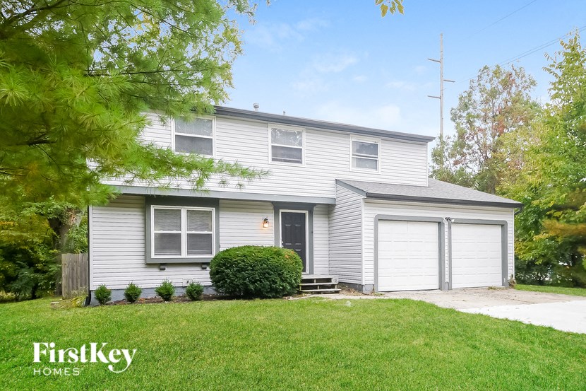 A house with a garage is for sale by FirstKey Homes.