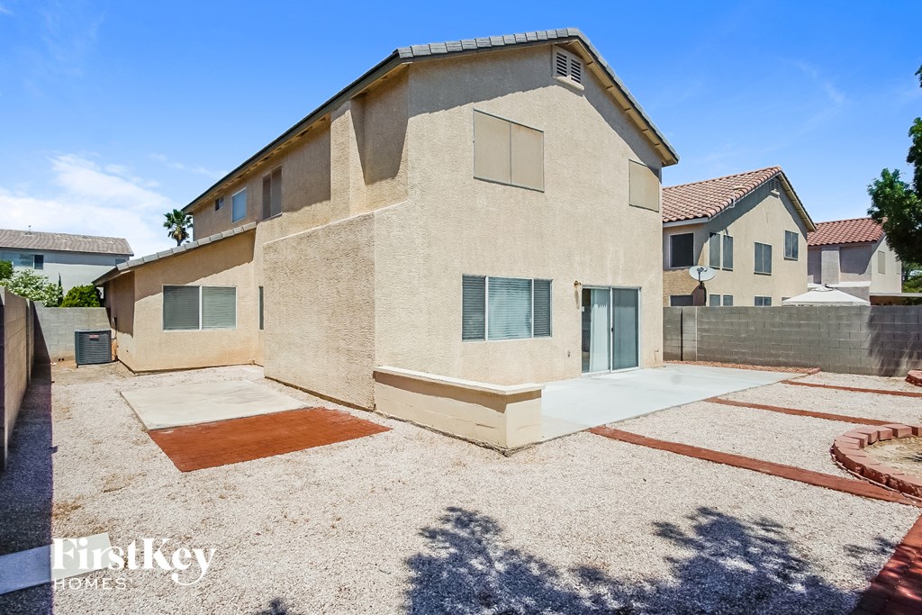 A house with a brown and beige exterior is for sale.