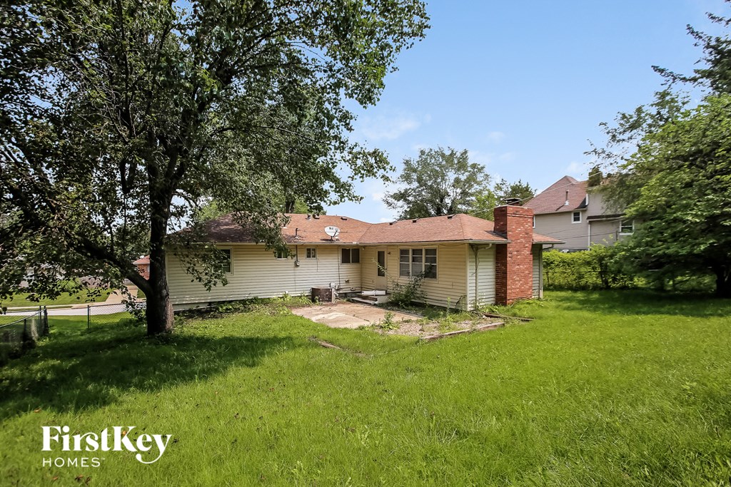 a view of the house from the back yard