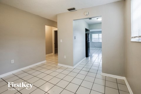 the living room and dining room are spacious and open to the hallway