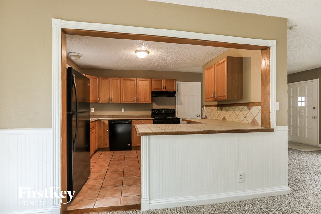 a view of the kitchen from the living room