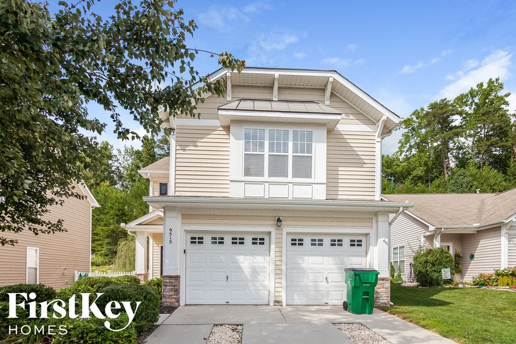 A two-story house with a garage is for sale by FirstKey Homes.