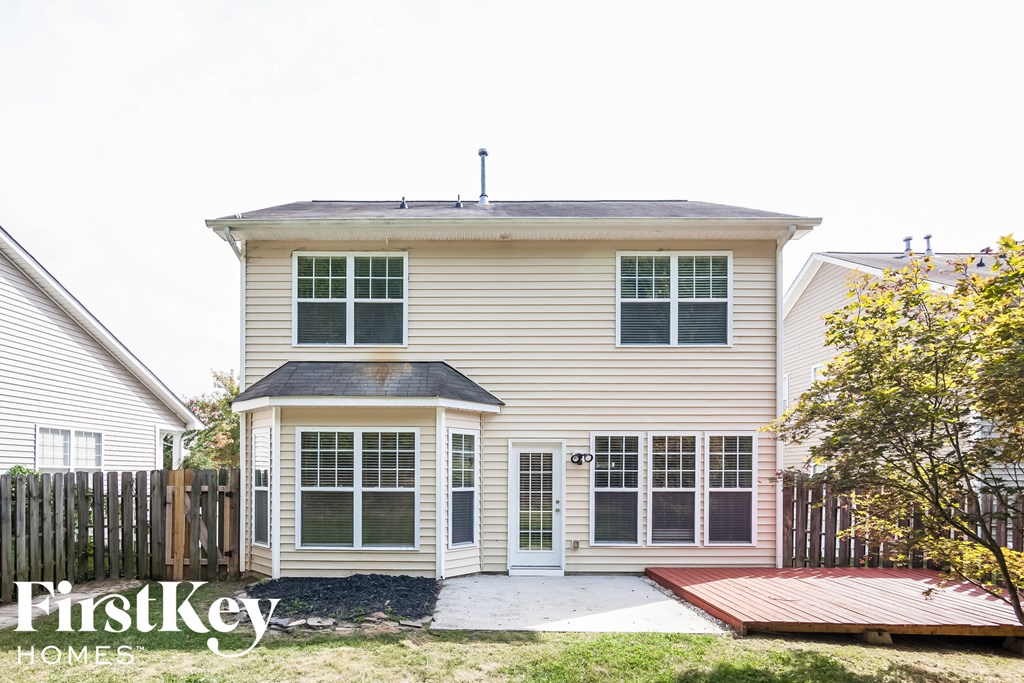 A house with a white door and a small porch.