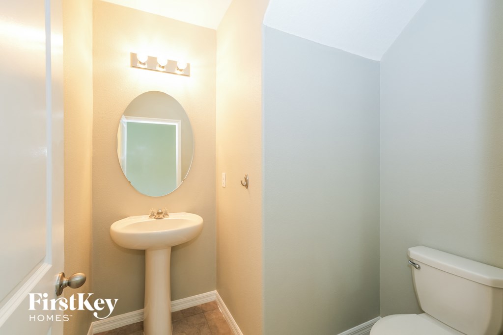 a small bathroom with a sink and a toilet