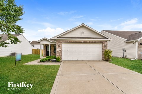 A house with a garage and a driveway is shown with the words "FirstKey Homes" on the bottom left.