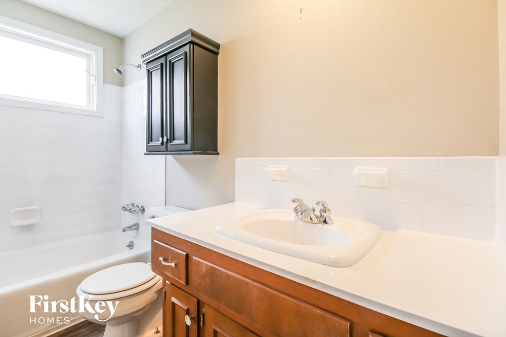 a bathroom with a sink and a toilet