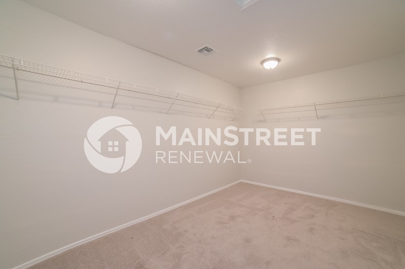 room with carpeted flooring and white walls
