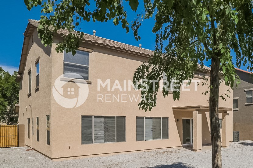 a building with a tree in front of it
