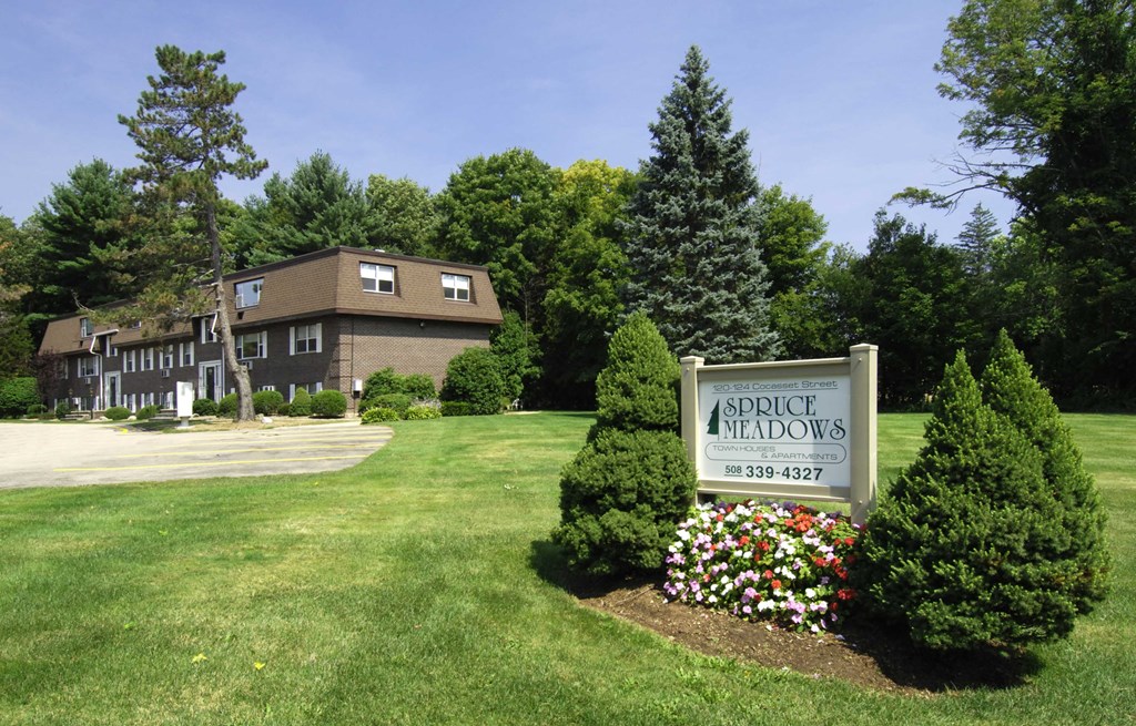 the sign in front of the arrigo mendelsons building at the park