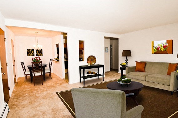 a living room with a couch and a table