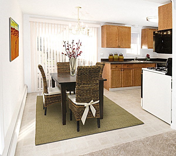 a kitchen with a table and chairs in it