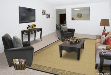 a living room with furniture and a television