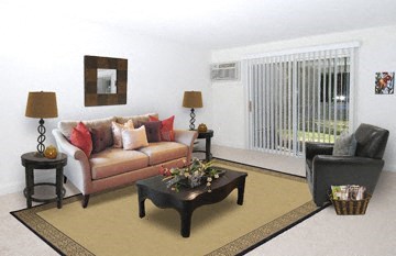 a living room with a couch and a table