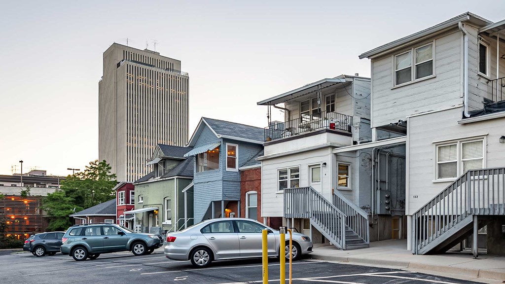 Front exterior view of several First Avenue Homes