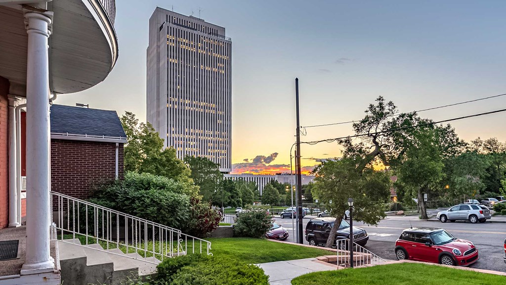 Front yard view from First Avenue Home overlooking the street and other buildings
