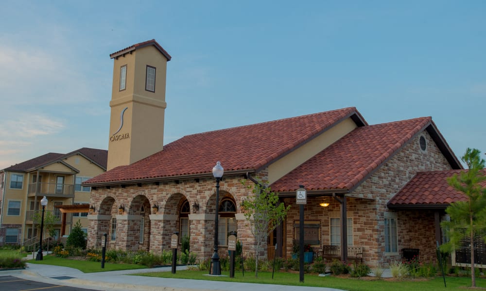 a church with a clock tower on the front of it