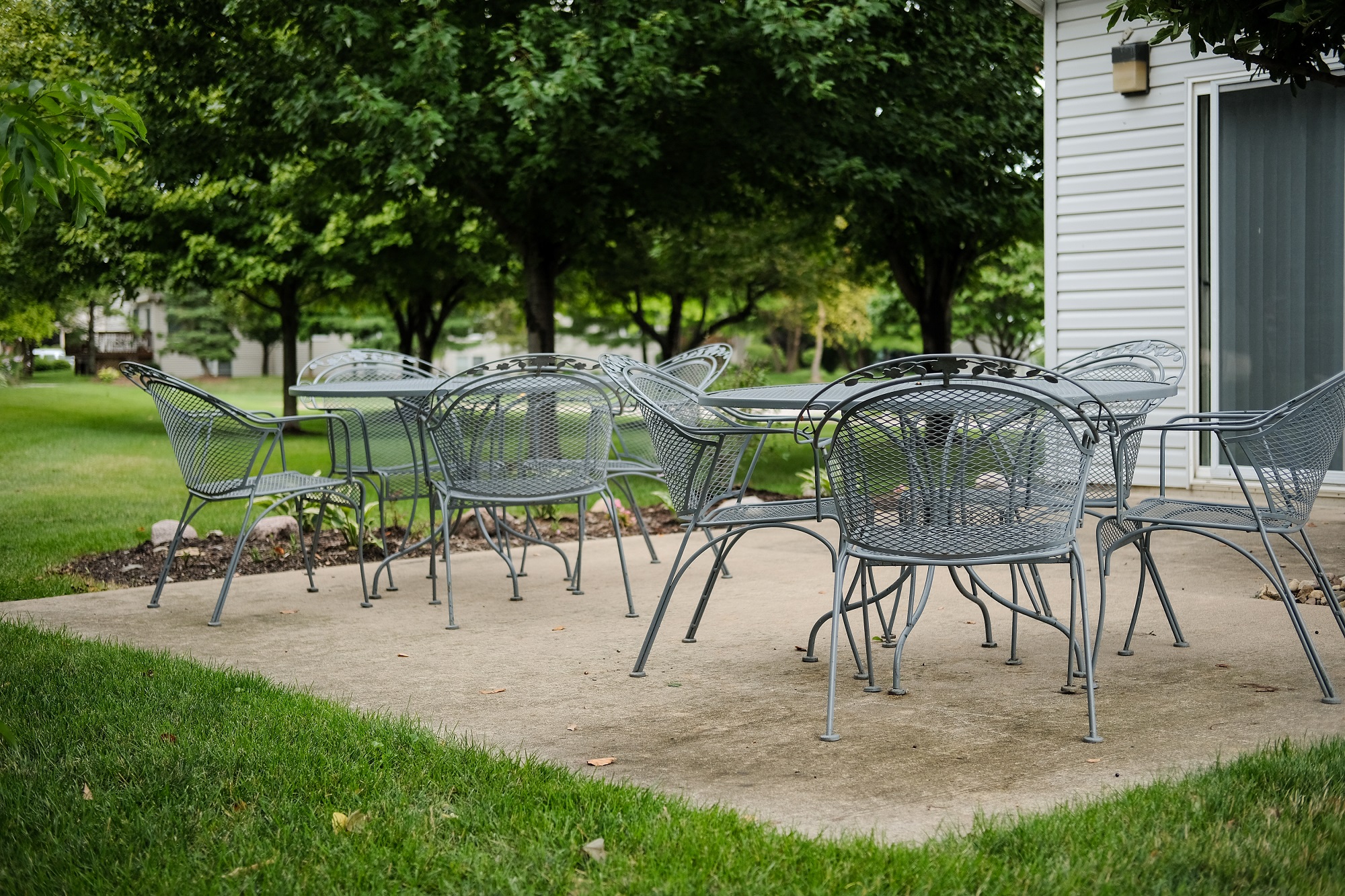 spacious clubhouse, outdoor patio with furniture, reserve small rental for guests inside and outside, at regency apartments in Bettendorf Iowa