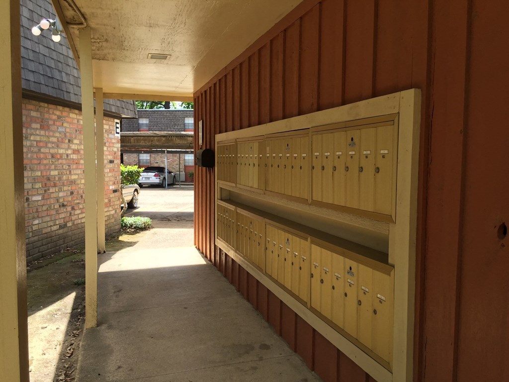 a view of the side of a building with a row of lockers