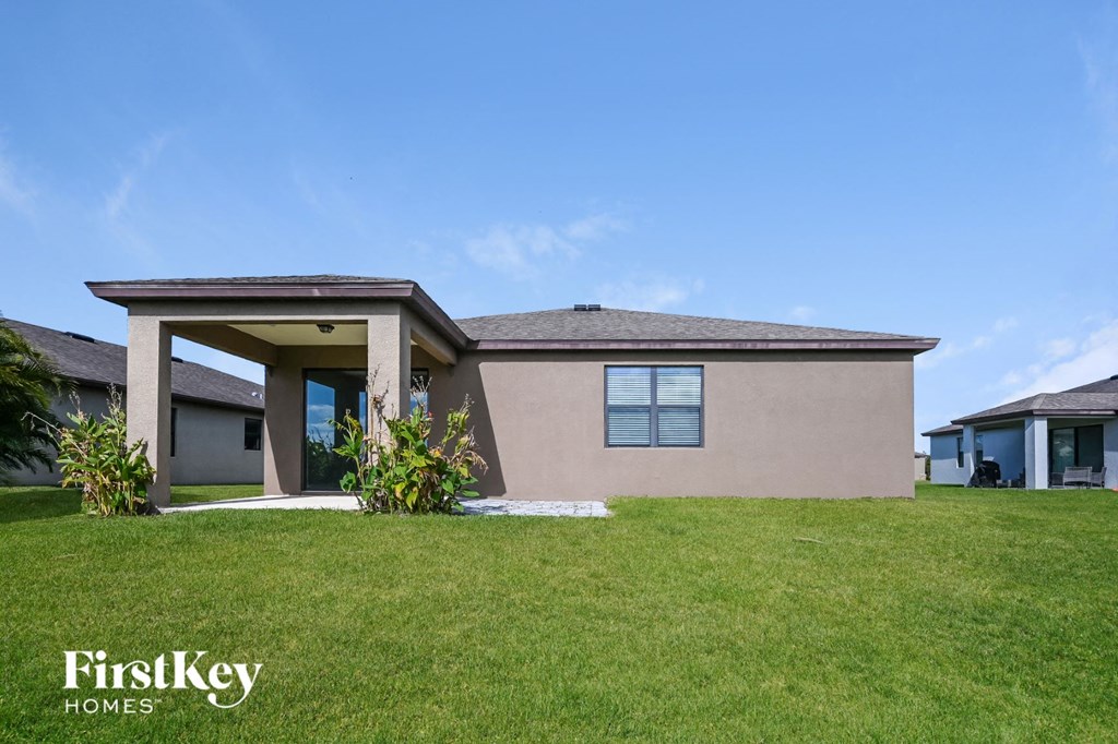 a house with a lawn in front of it