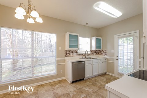 A kitchen with a dishwasher and a sink.