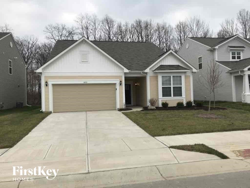 A house with a garage is shown in the image.