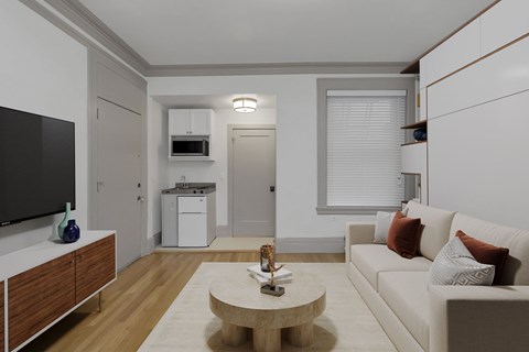 A modern living room with a white couch and a wooden coffee table.