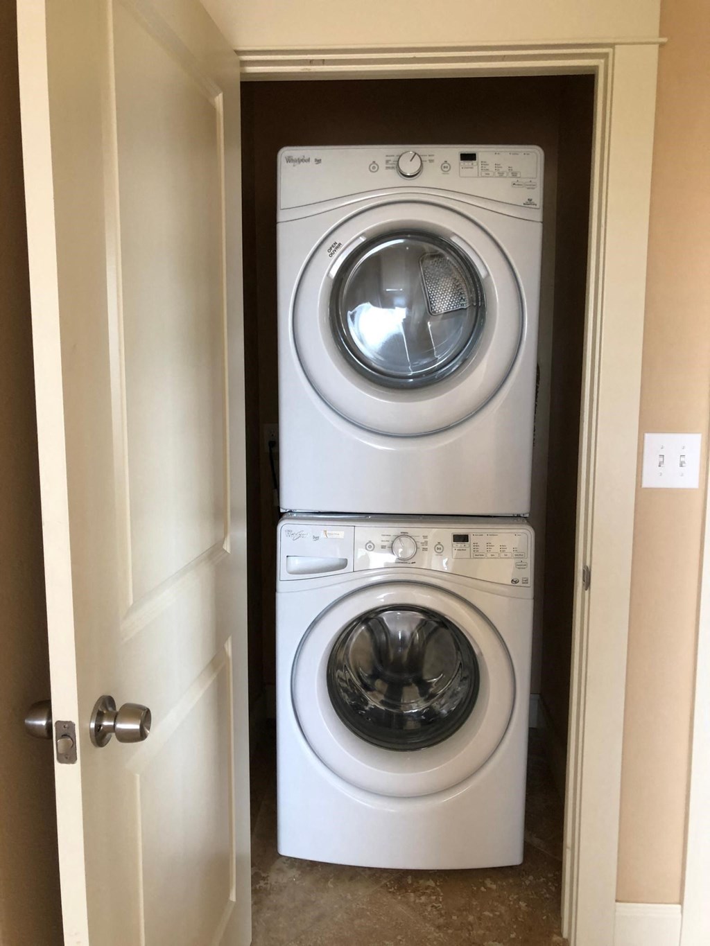 a washing machine and dryer in a closet