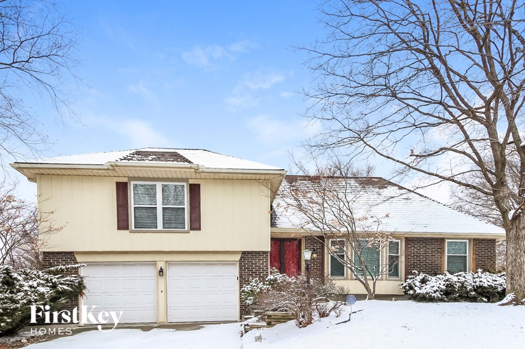 a house with snow on the ground