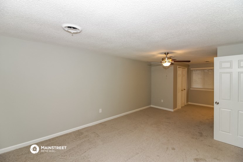 the spacious living room and dining room of a manufactured home