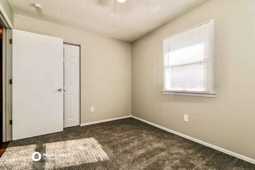 the bedroom of our studio apartment atrium