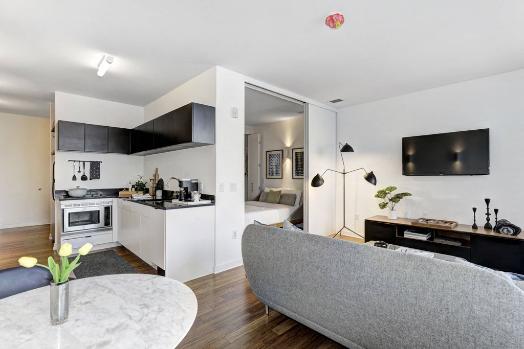 a living room with a couch and a table