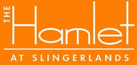 a sign for the home with an orange background