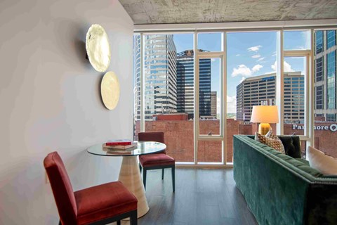 a living room with a view of the city