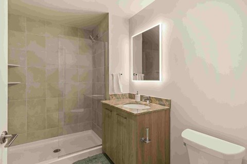 a small bathroom with a toilet sink and shower