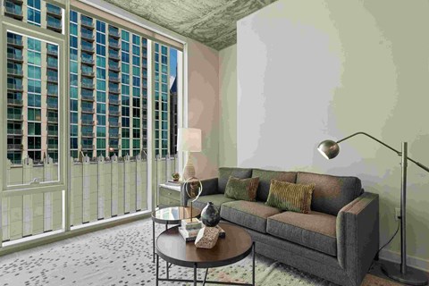 a living room with a couch and a table