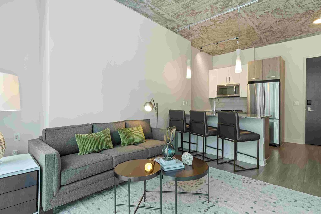 a living room with a couch and a table