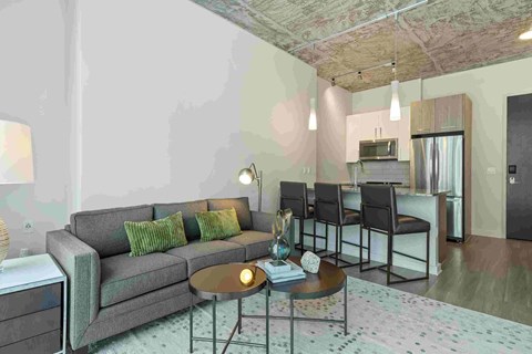 a living room with a couch and a table