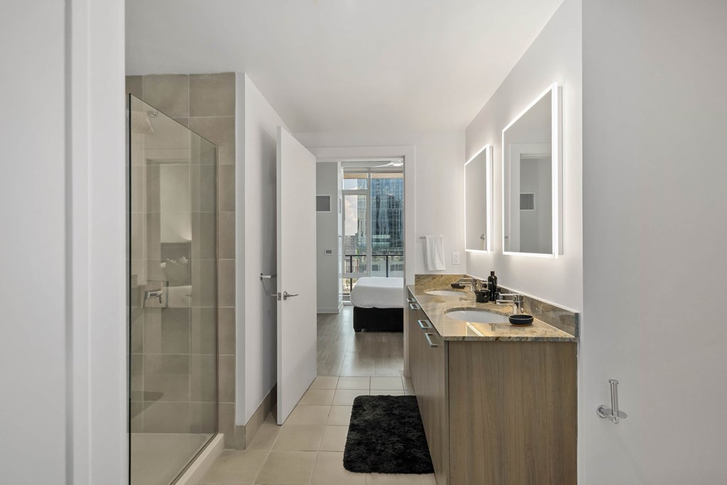 a bathroom with a sink and a shower