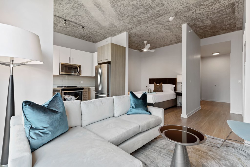 a living room with a couch and a table